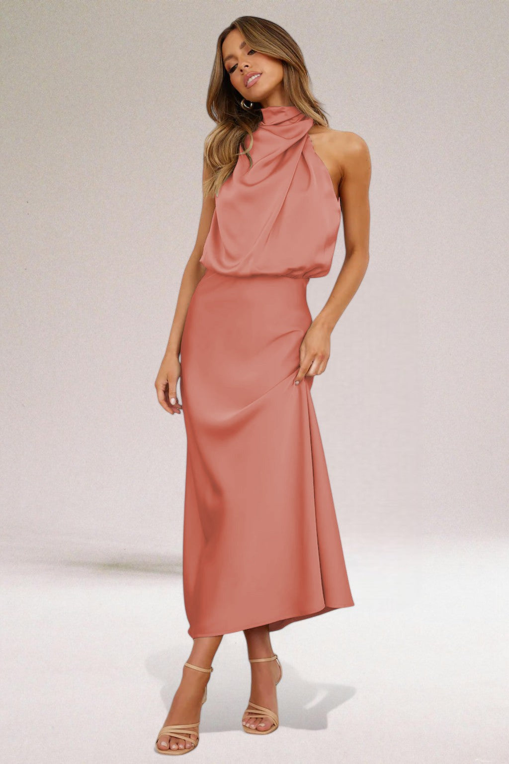 Sophisticated draped midi dress for women with a chic cowl neck and sleeveless design, ideal for special occasion wear.