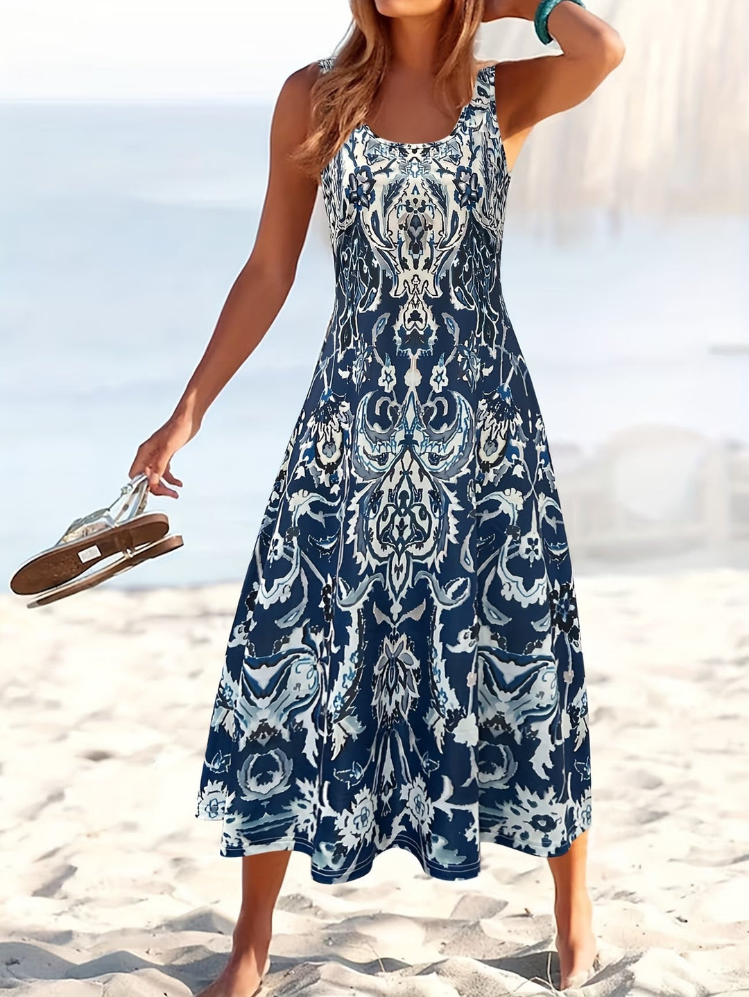 Chic green floral sleeveless summer midi dress. Effortless casual style, comfortable for daily wear.