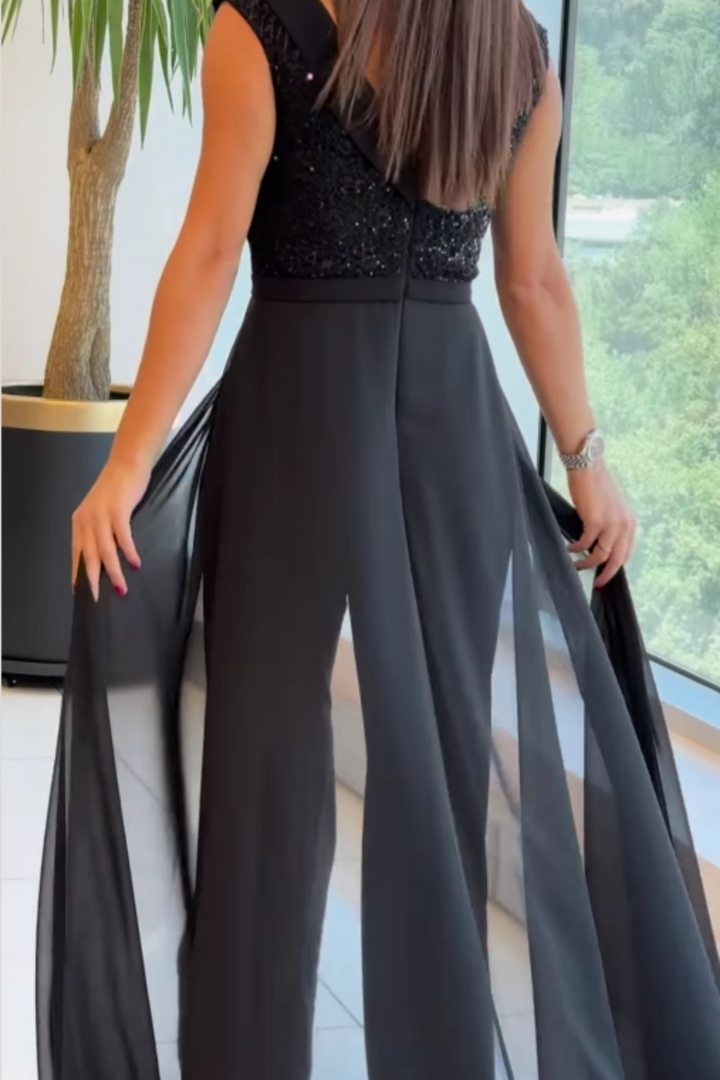 Black elegant sequin sleeveless jumpsuit for women, ideal formal party outfit or special occasion one-piece.