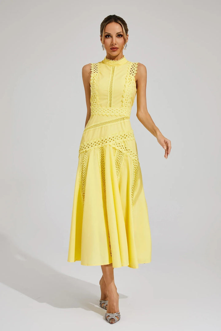 Elegant women's sleeveless lace midi dress, perfect for a wedding guest or special occasion. Chic and sophisticated.