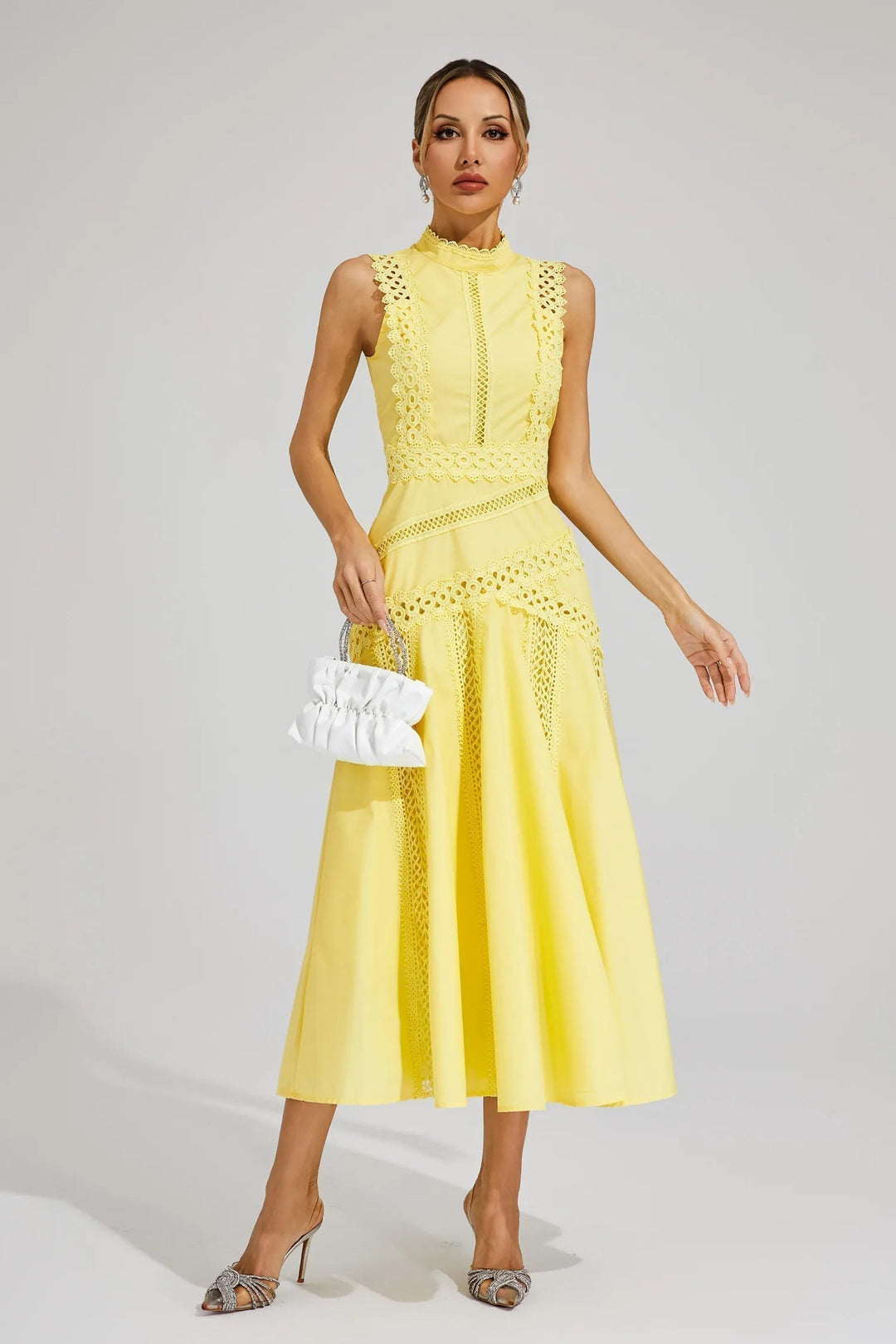 Women's elegant lace midi dress with a sleeveless design, perfect for wedding guests, cocktail parties & formal events.