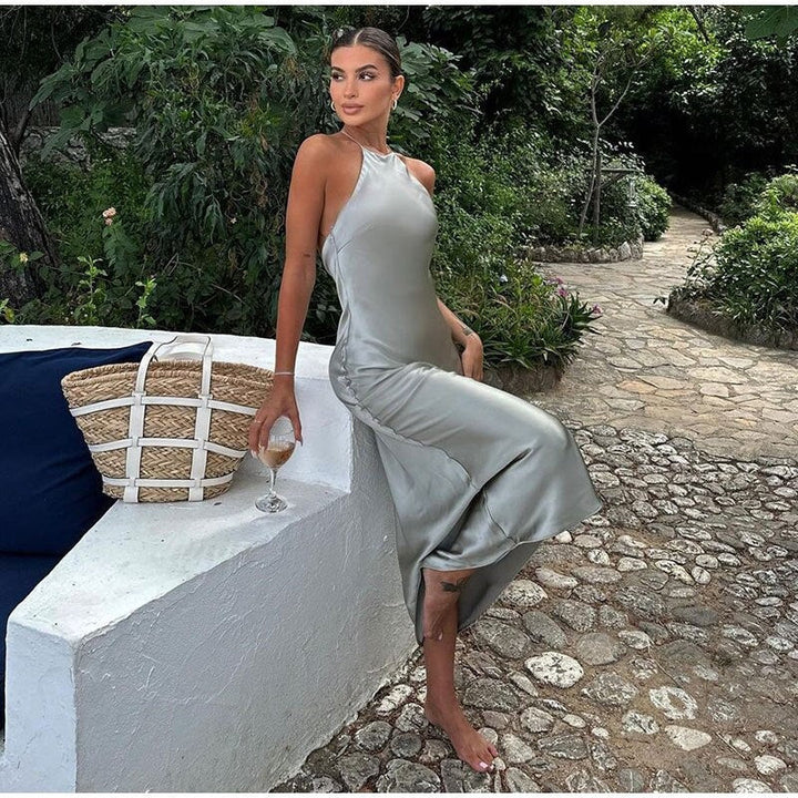 Women's elegant open back maxi dress, a flattering sleeveless design for formal wear & evening occasions.