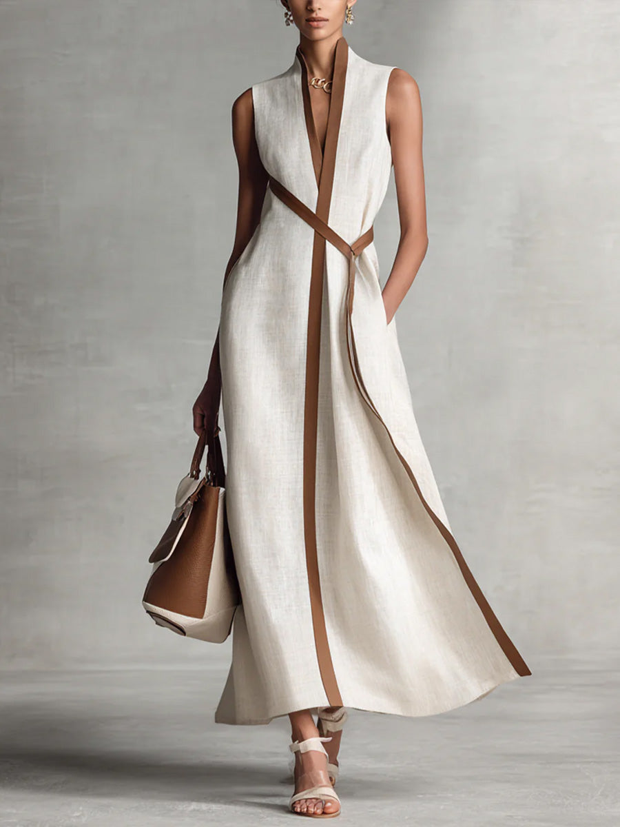 Elegant women's sleeveless maxi dress with contrast trim, perfect for summer special occasions. Flowy & comfortable.
