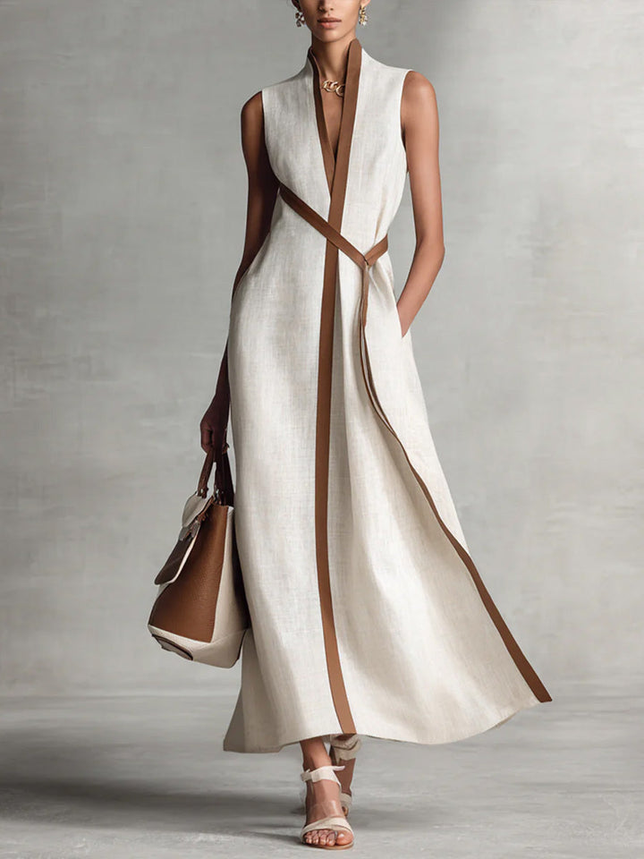 Elegant women's sleeveless maxi dress with contrast trim, perfect for summer special occasions. Flowy & comfortable.