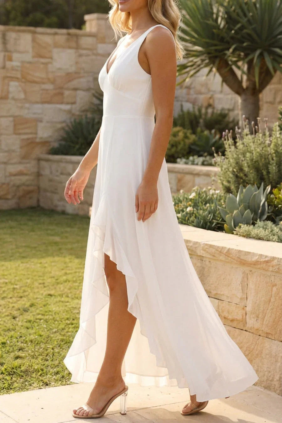 Women's elegant V-neck sleeveless long dress with a high split. Formal maxi gown, ideal for wedding guests & evening parties.