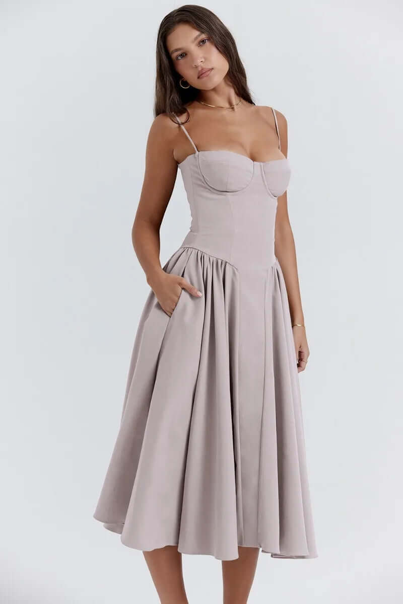 Summer-ready women's sleeveless midi dress, elegant corset fit, chic fashion.