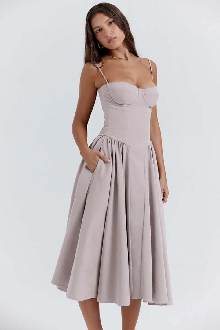 Summer-ready women's sleeveless midi dress, elegant corset fit, chic fashion.