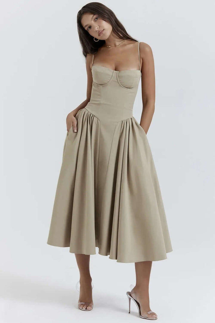 Trendy women's elegant sleeveless midi dress, corset fit design for modern style.