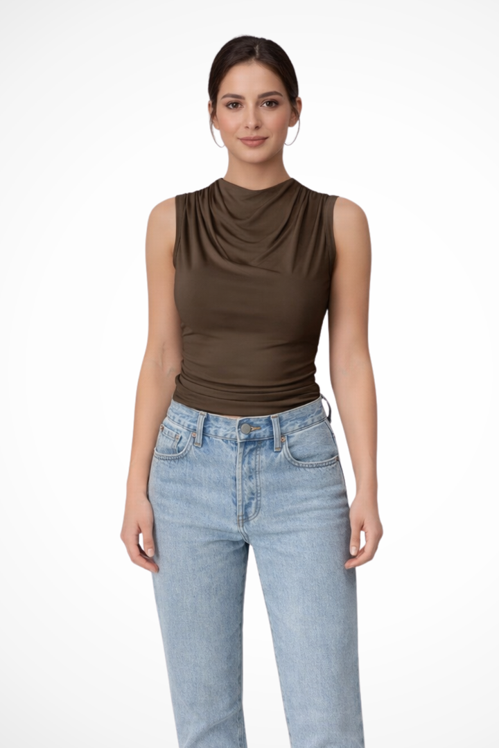 Elegant women's sleeveless peplum top with draped neck, perfect for smart casual or office wear. Chic & stylish.