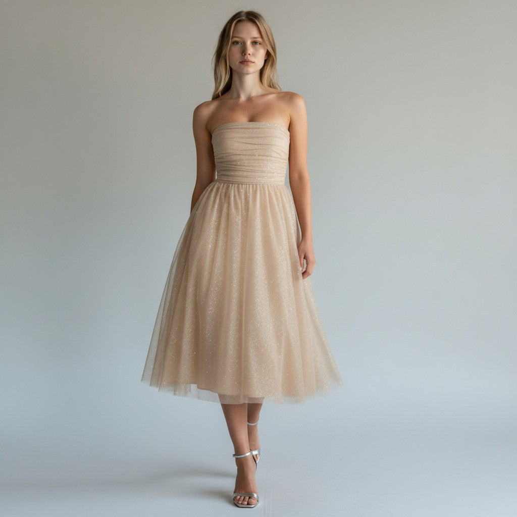 Stunning women's elegant sequin midi dress. Flowing fabric, sleeveless cut, ideal for evening, cocktail & party events.