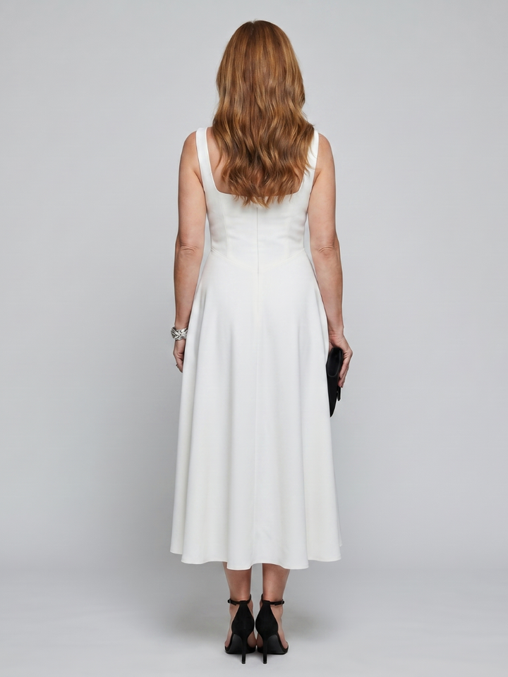 Fashionable square neck midi dress for women, sleeveless and flared for a flattering silhouette. Great for casual elegance.
