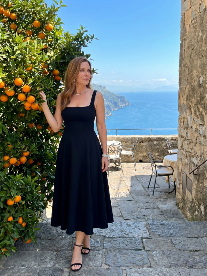 Summer-ready women's sleeveless midi dress with a sophisticated square neck & graceful flared skirt. Perfect for any day.