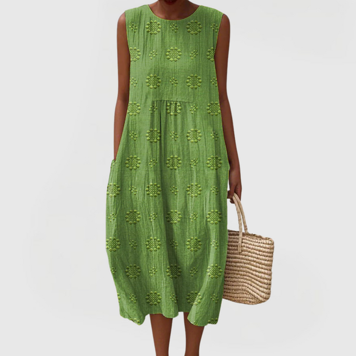Elegant women's sleeveless summer dress with convenient pockets, perfect for a chic and comfortable look.