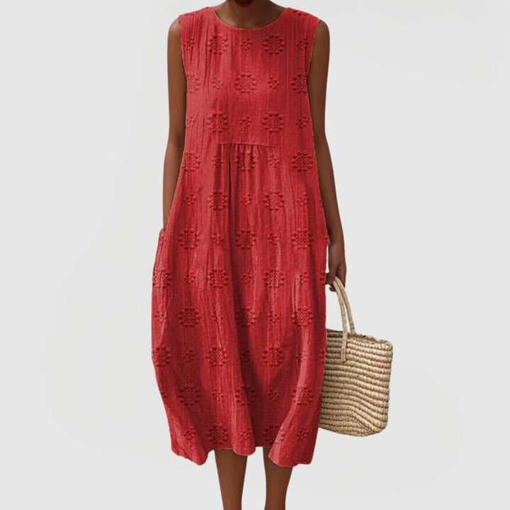 Stylish women's summer dress with elegant floral embroidery, sleeveless design & versatile pockets for everyday.