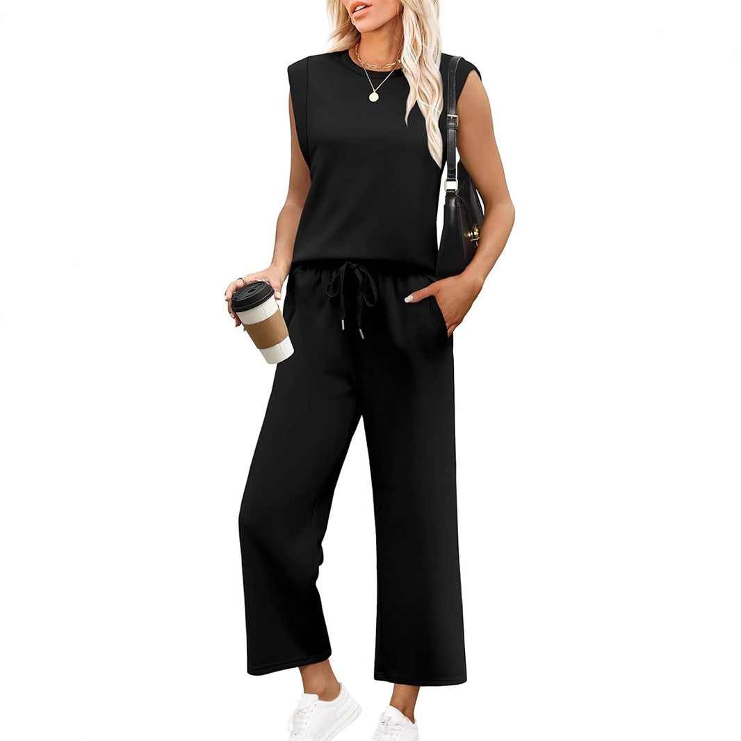 Chic matching women's sleeveless top & wide-leg trousers. Ideal for elegant casual or travel outfits.