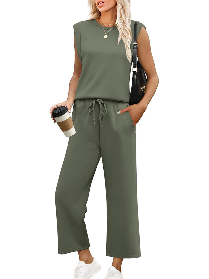 Women's comfortable sleeveless top & wide-leg trousers two-piece set for stylish casual summer wear.
