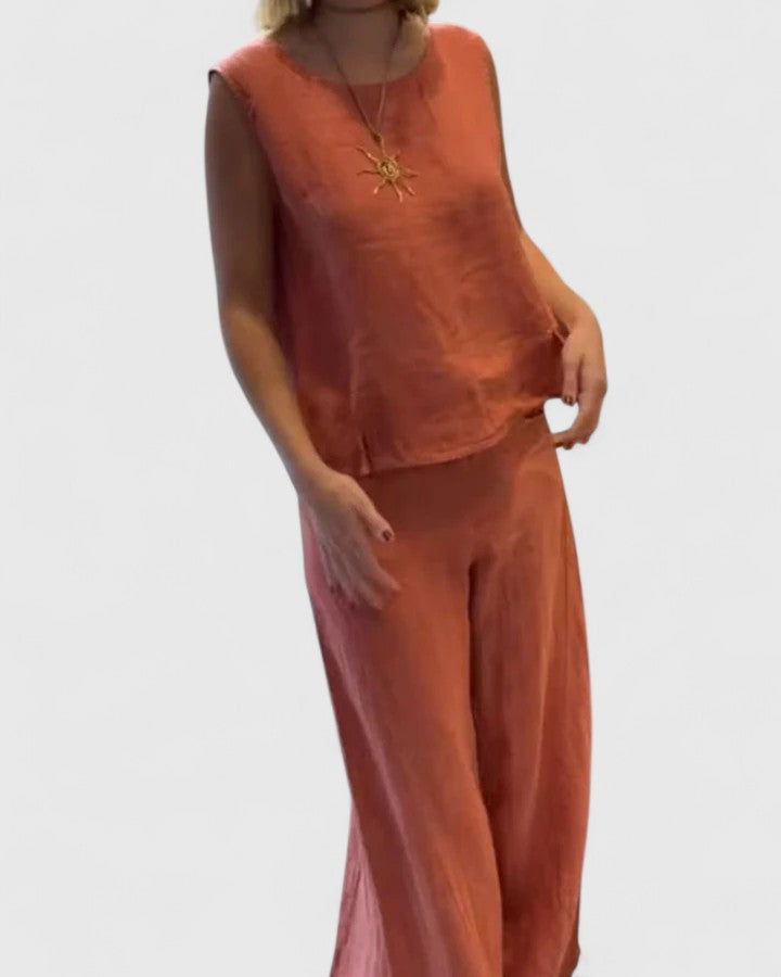 Trendy women's fashion: a sophisticated two-piece outfit with sleeveless top and wide-leg pants.