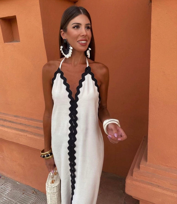 Chic women's V-neck sleeveless maxi dress, an elegant formal gown for special occasions & wedding guests.