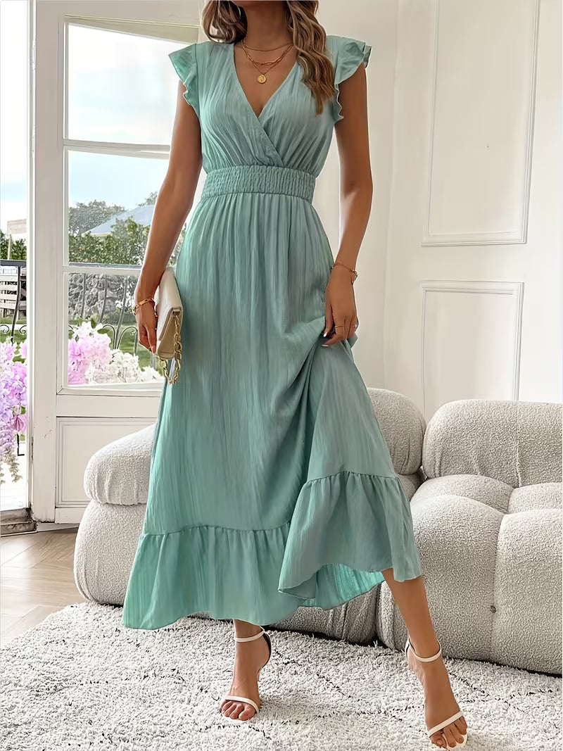 Elegant women's sleeveless V-neck ruffled dress, perfect for chic party and summer occasions.