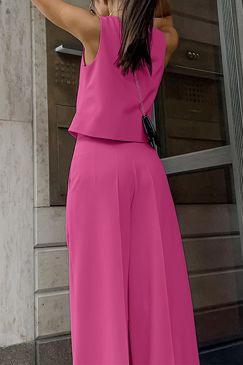 Chic women's tailored two-piece set featuring a sleeveless waistcoat and flowing wide-leg trousers.