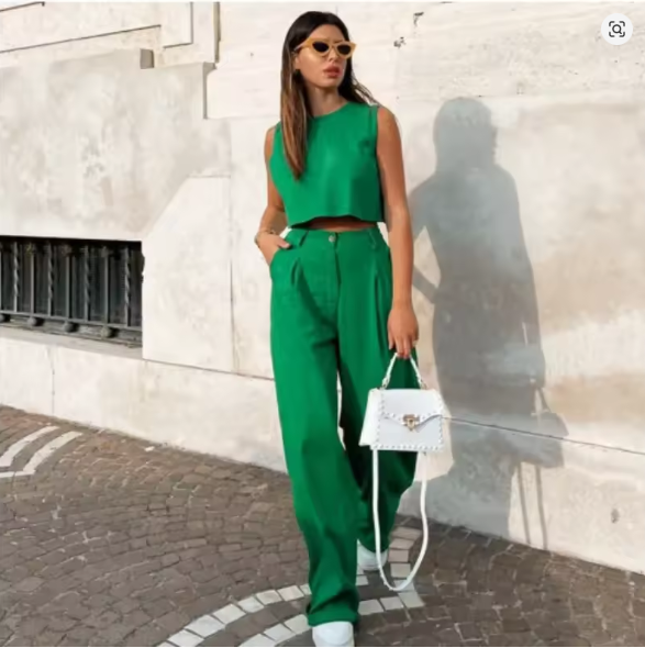 Fashionable women's two-piece set: elegant sleeveless top and chic wide-leg trousers for a polished look.