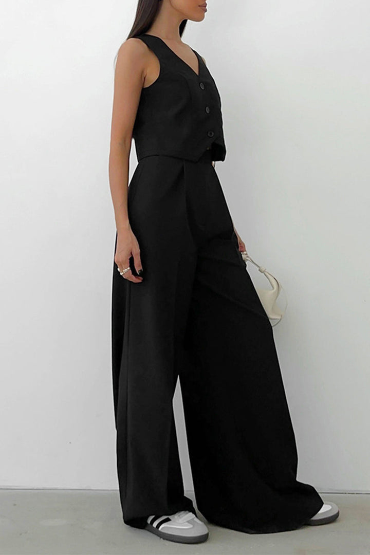 Comfortable yet elegant women's matching outfit: sleeveless vest and smart wide-leg pants. Professional chic.