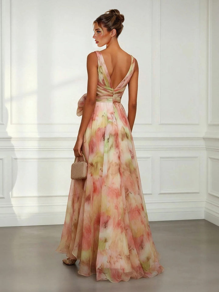 Beautiful V-neck tie-waist maxi dress for women. Perfect formal or special occasion wear with an elegant watercolour print.
