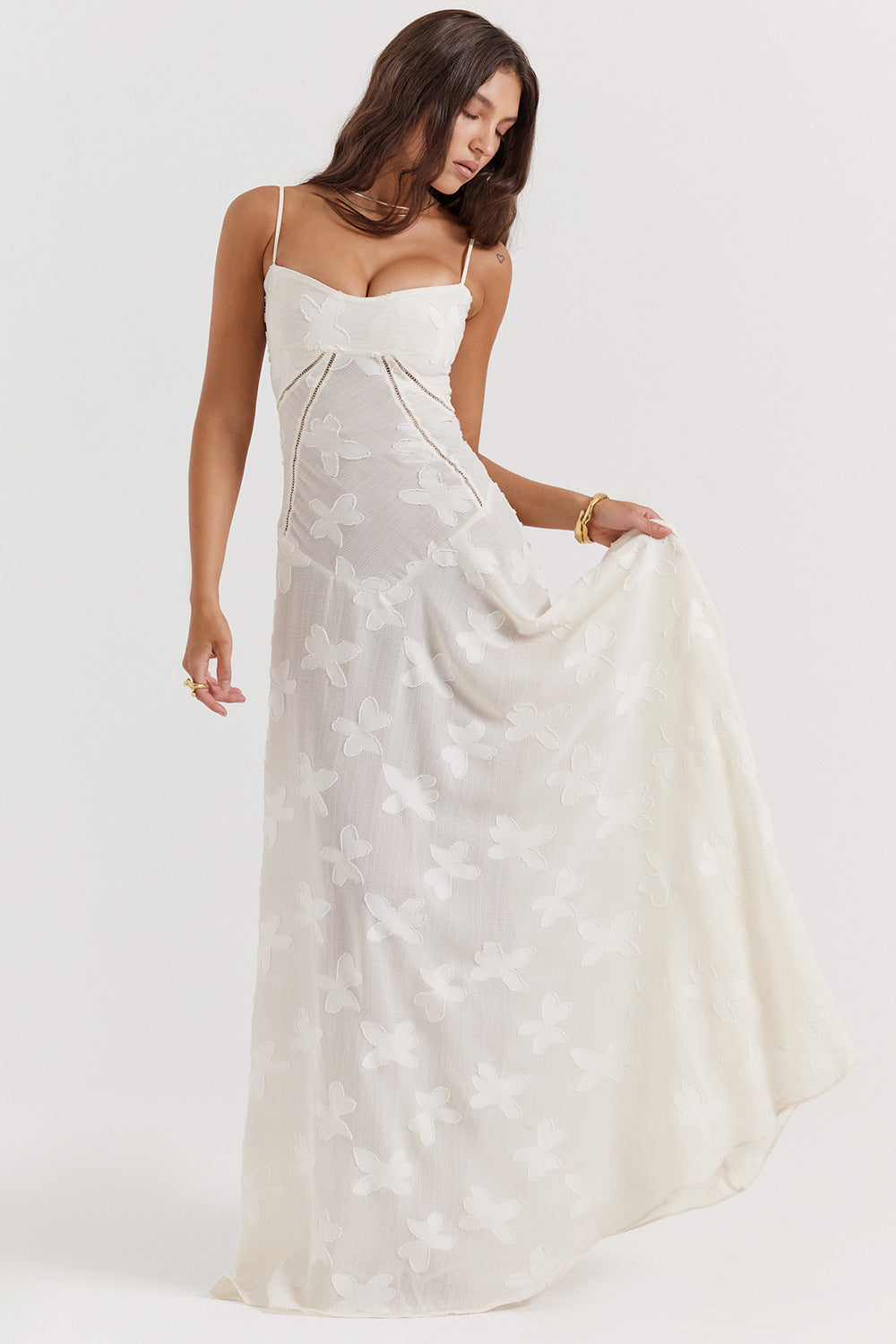 Stylish women's summer maxi dress with spaghetti straps, featuring a flattering slim fit for a chic look.