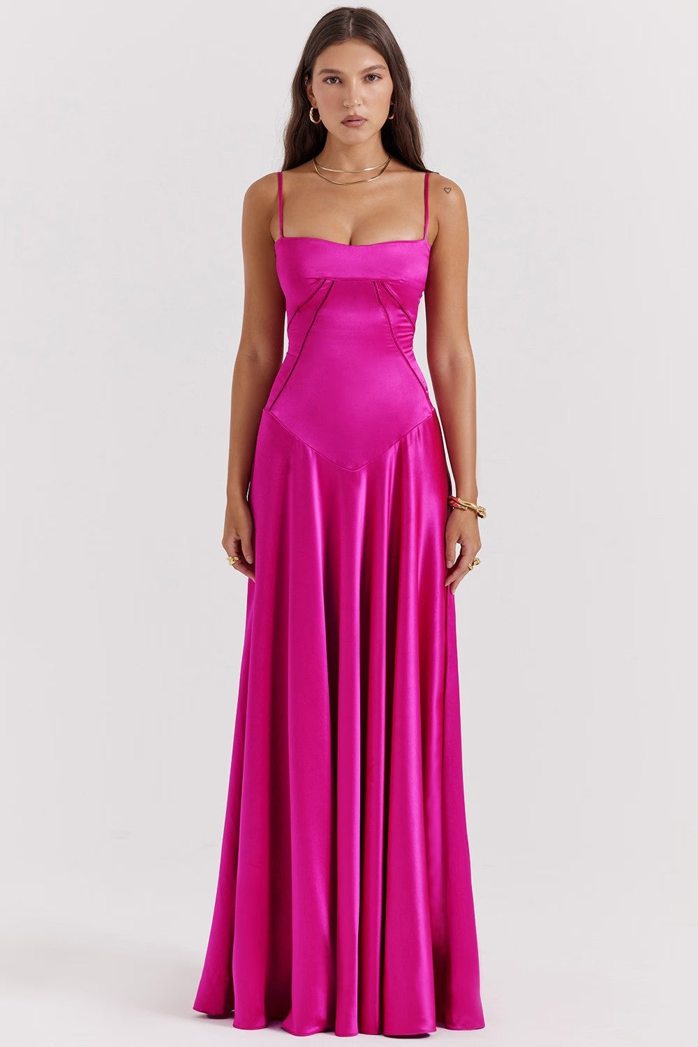 Sleek women's slim-fit maxi dress, featuring elegant spaghetti straps for a fashionable evening or party ensemble.
