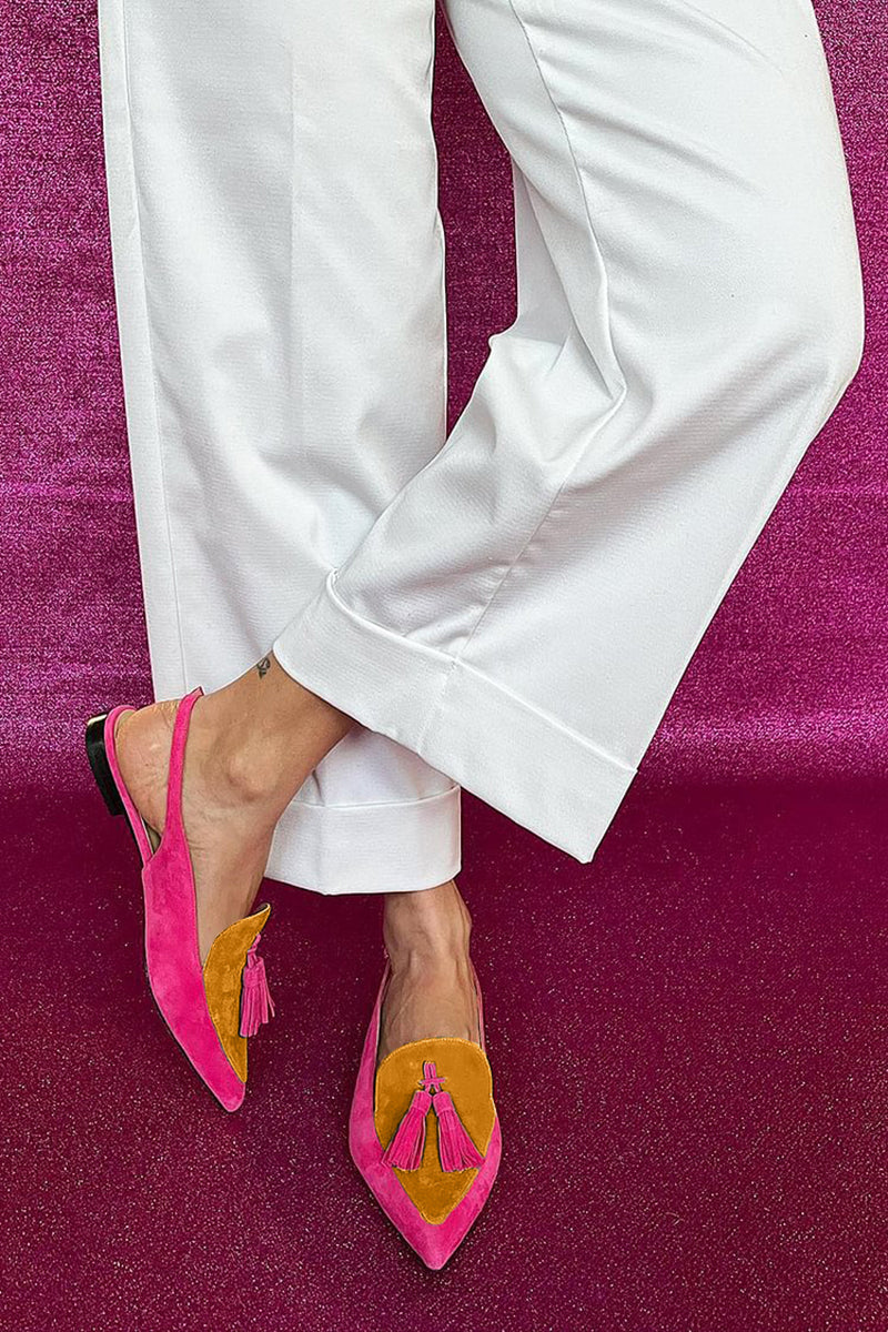 Women's fashion loafers: elegant pointed toe slingbacks featuring stylish tassel detail. Perfect casual or smart footwear.