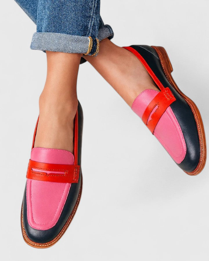 Elegant women's slip-on loafers in black, perfect for smart casual or daily wear, offering sophisticated style & comfort.