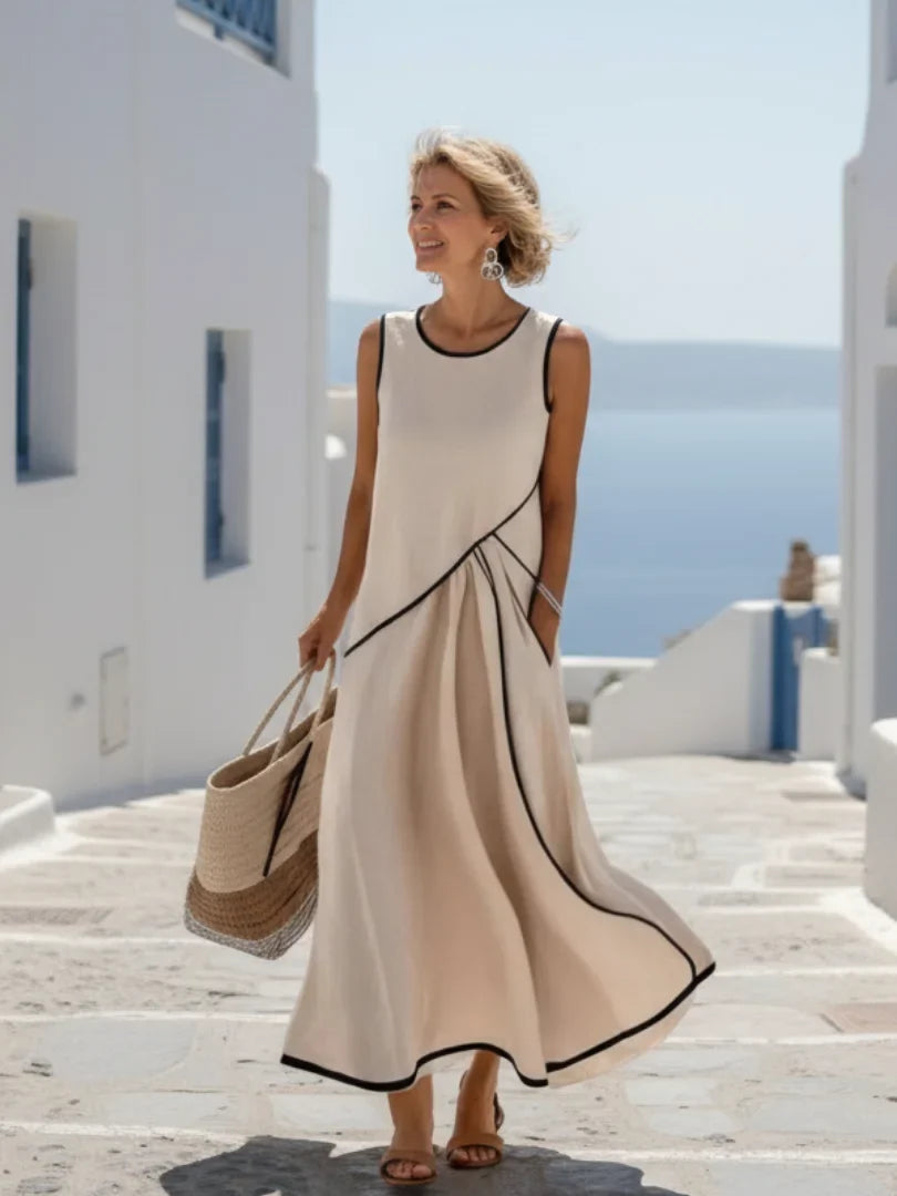 Elegant women's solid A-line maxi dress. Sleeveless, round neck, with stylish piping detail. Perfect for summer.