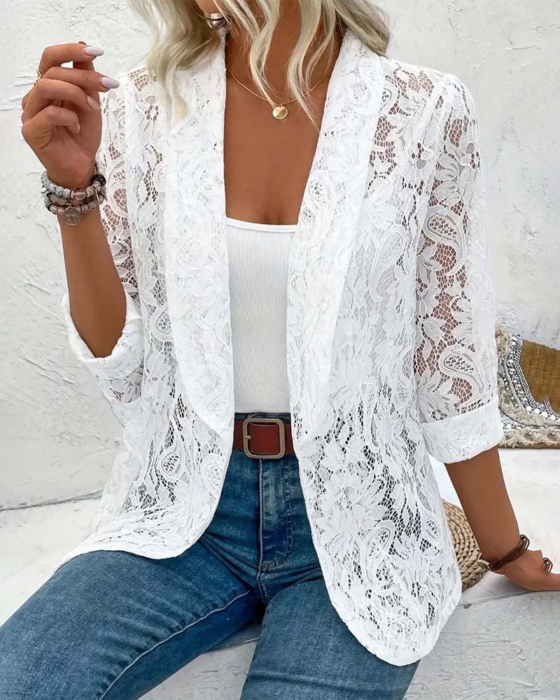 Elegant women's solid color blazer with delicate lace trim, perfect for sophisticated office attire or formal spring events.
