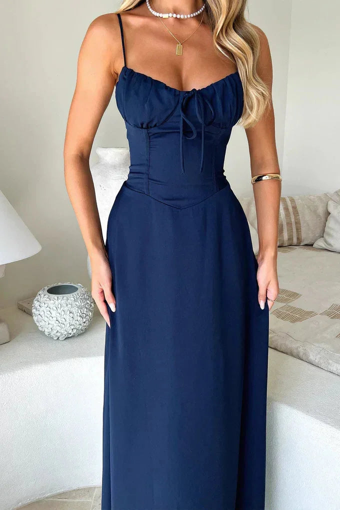 Stylish women's summer maxi dress, spaghetti strap design with a fashionable tie-front bust for parties.