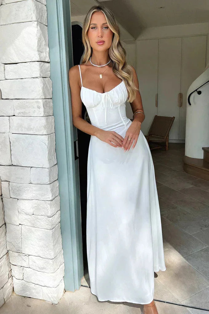 Wedding guest spaghetti strap maxi dress with elegant tie-front detail, a sophisticated and flowy style.