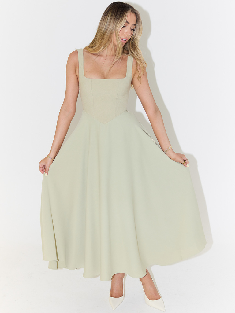 Modern women's midi dress featuring an elegant square neck and flowy A-line cut.