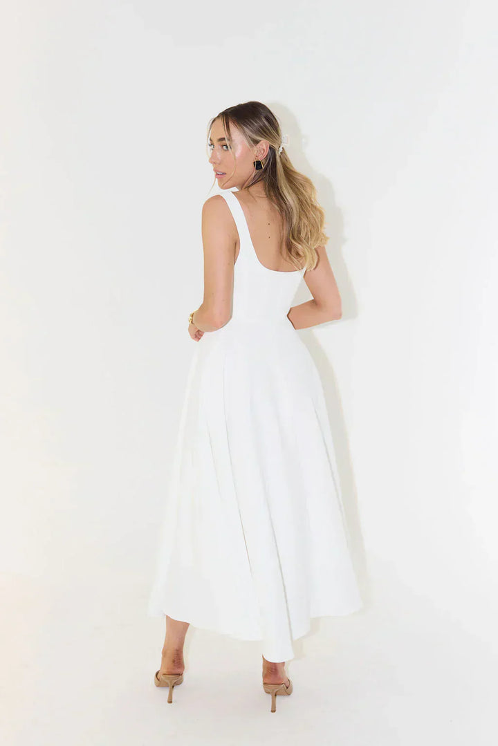 Chic women's midi dress featuring a stylish square neckline & A-line flared silhouette, ideal for spring/summer fashion.