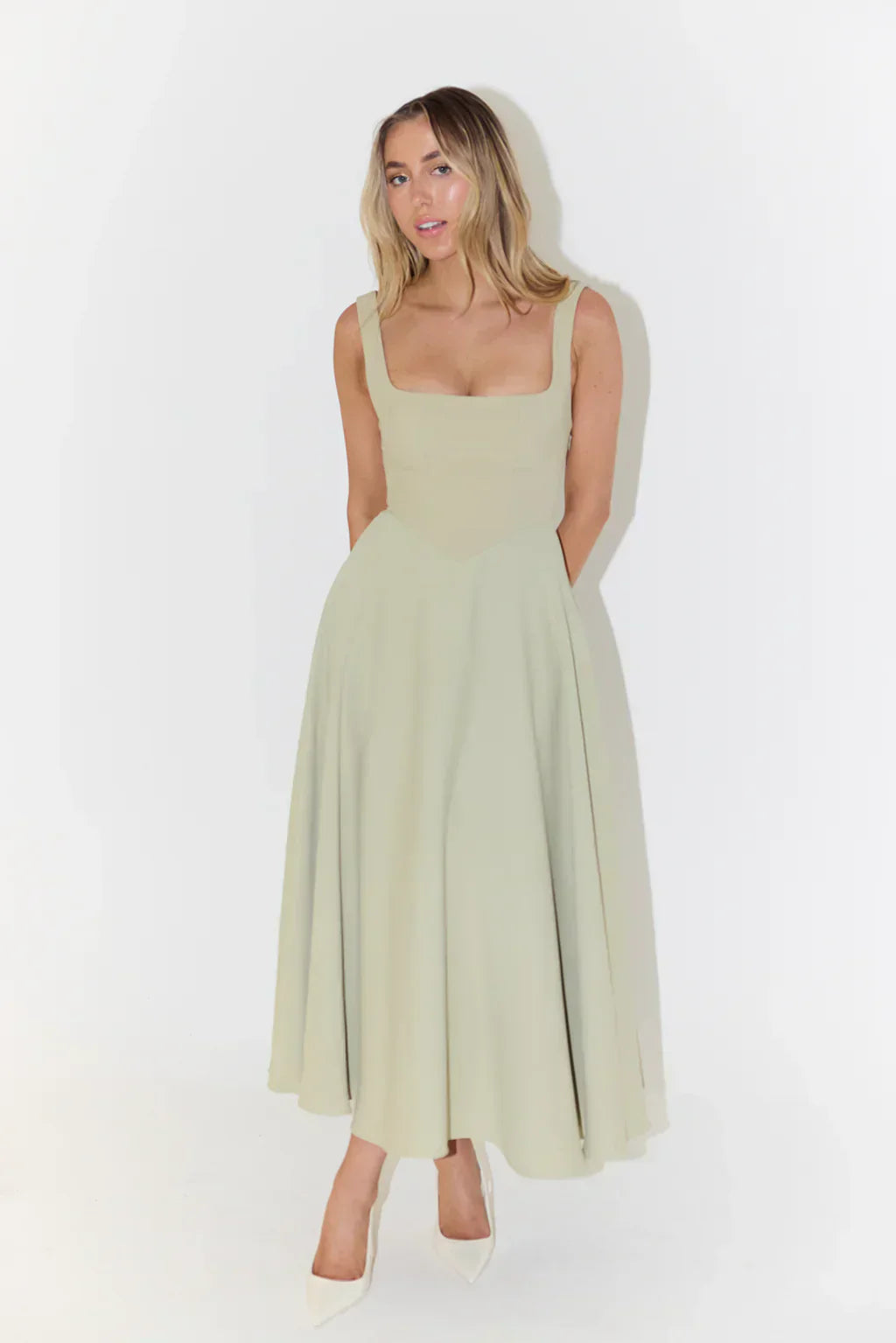 Sophisticated women's square neck midi dress, an A-line flared style offering elegance and comfort for any occasion.