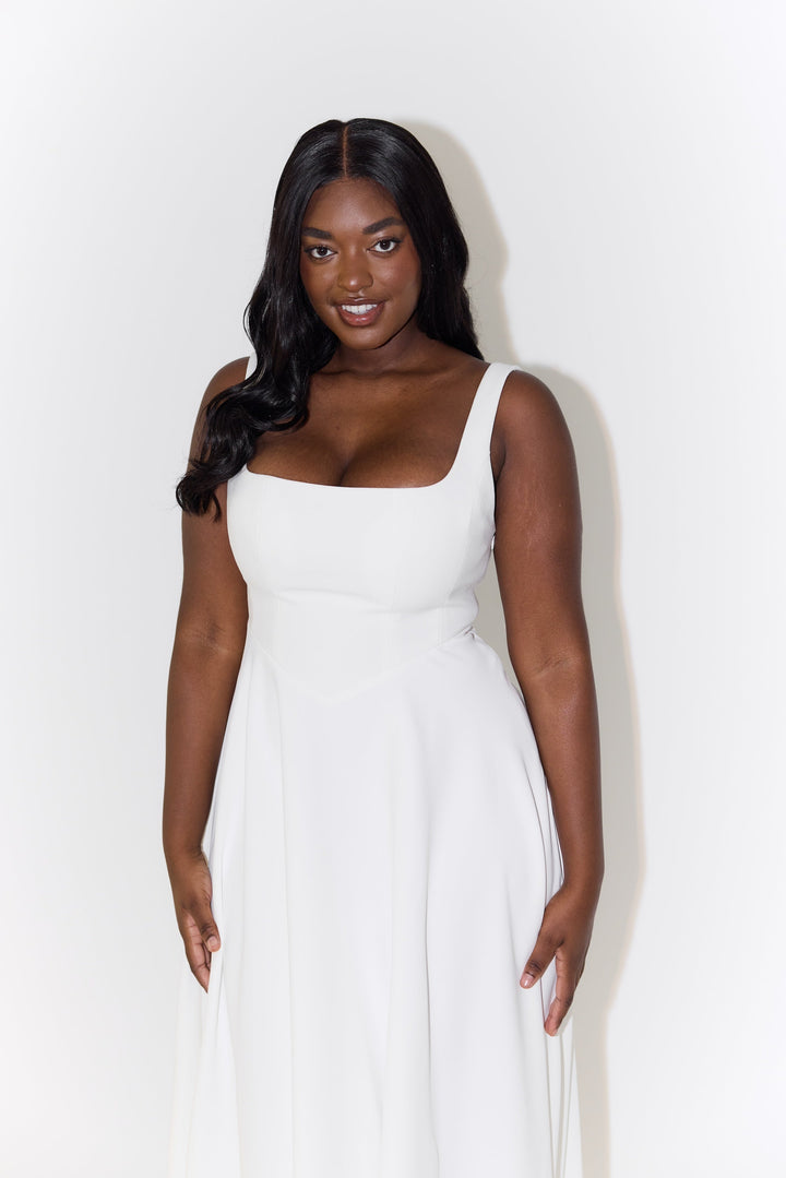 Chic sleeveless square neck midi dress for women, an elegant summer choice.