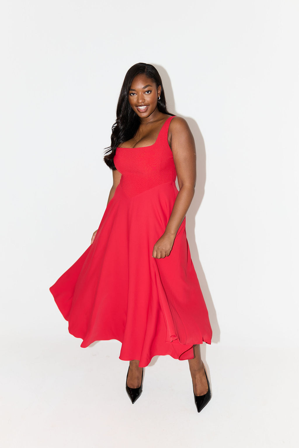 Summer party women's midi dress, elegant A-line, sleeveless, and square neck design.