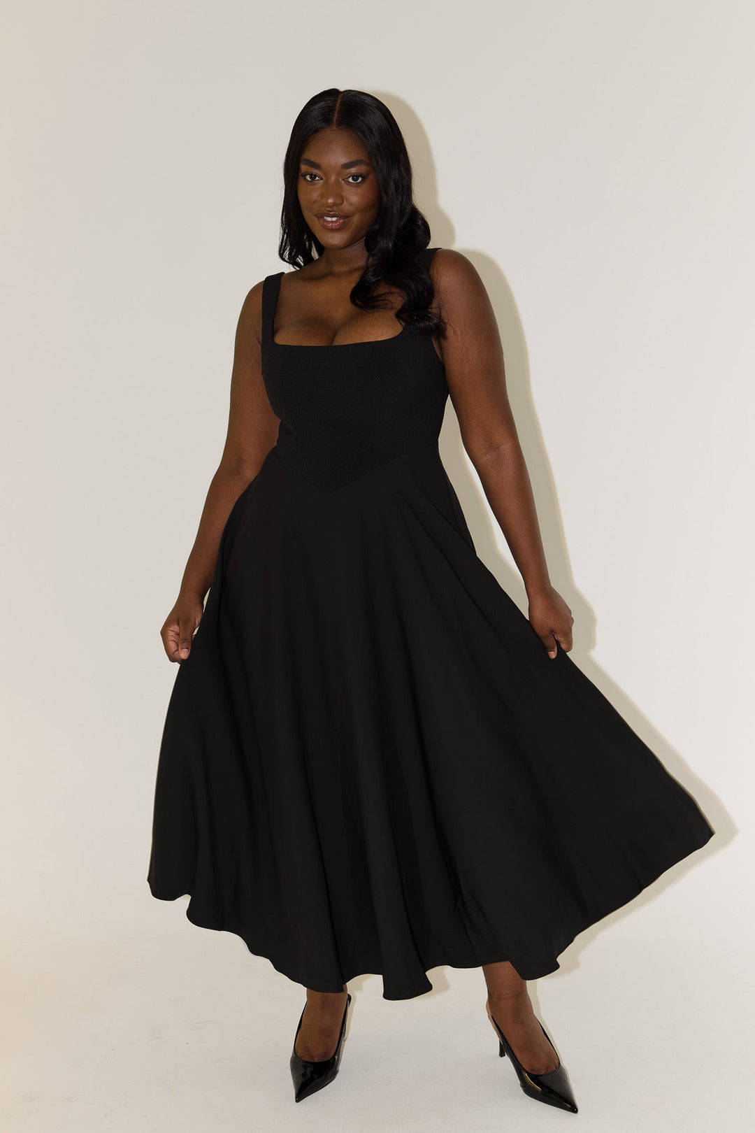 Casual square neck midi dress for women, a comfortable sleeveless A-line style.