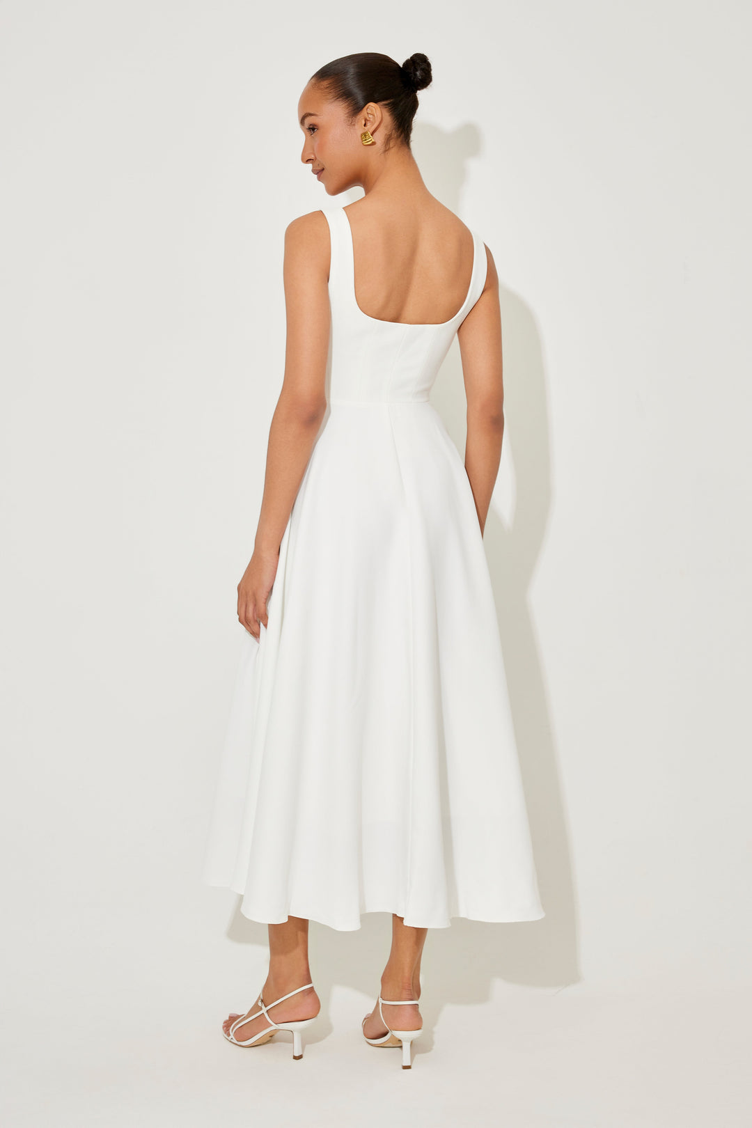 Stylish women's square neck midi dress, sleeveless and a flattering A-line cut.