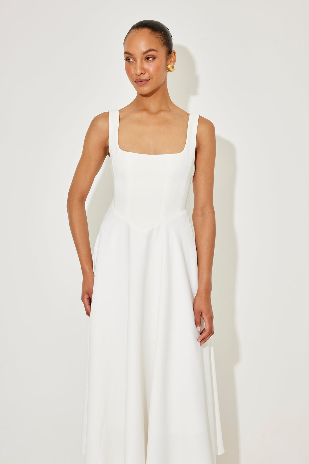 Summer essential: elegant women's sleeveless midi dress with a chic square neck.