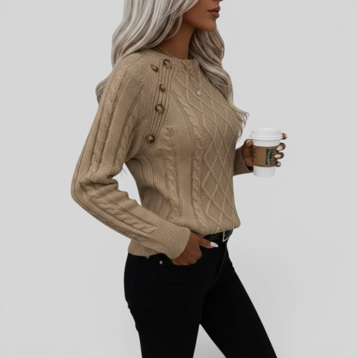 Fashionable women's square neck pullover with charming button details & trendy lantern sleeves.