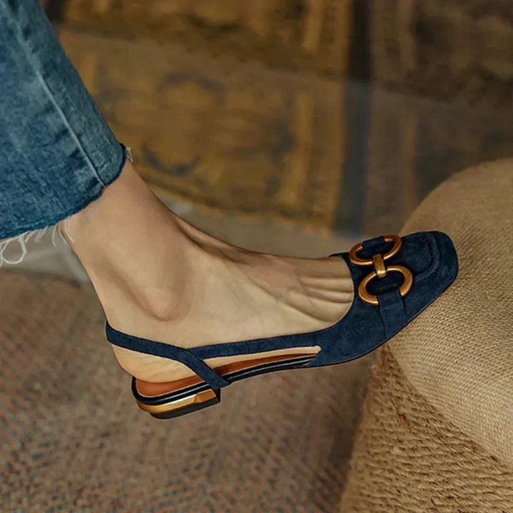 Stylish women's square toe slingback sandals with comfortable flat sole. Features an adjustable strap for everyday wear.