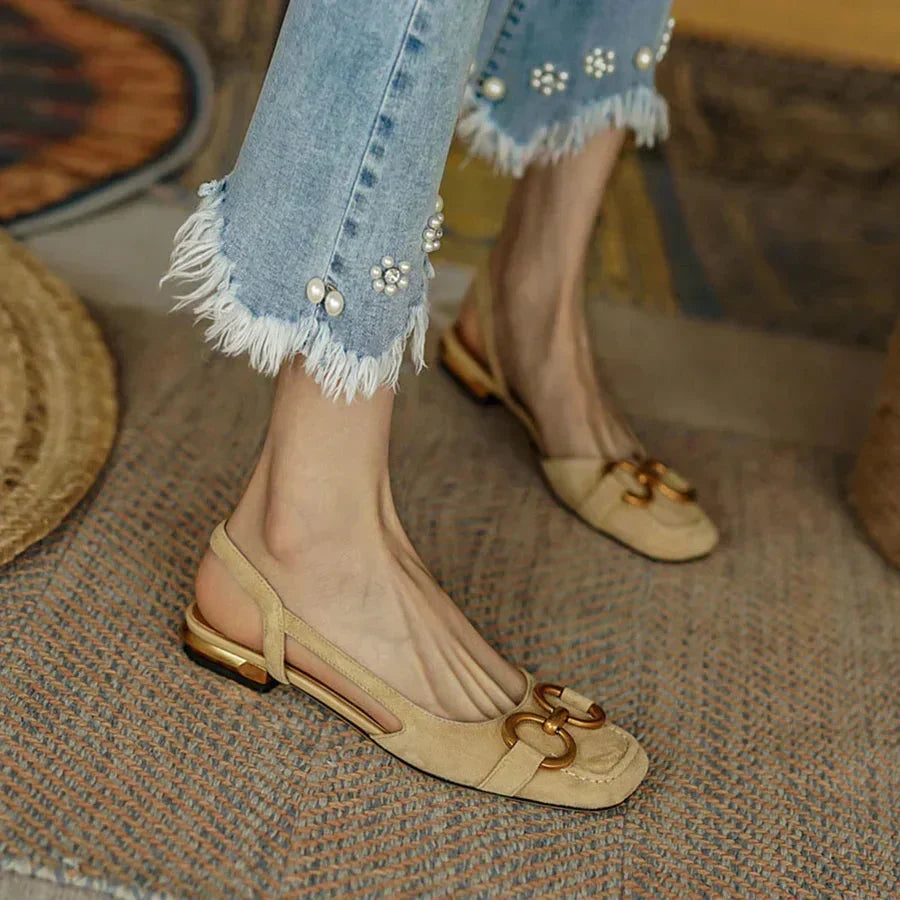 Women's elegant square toe slingback flat sandals. Comfortable footwear with an adjustable strap, ideal for summer fashion.