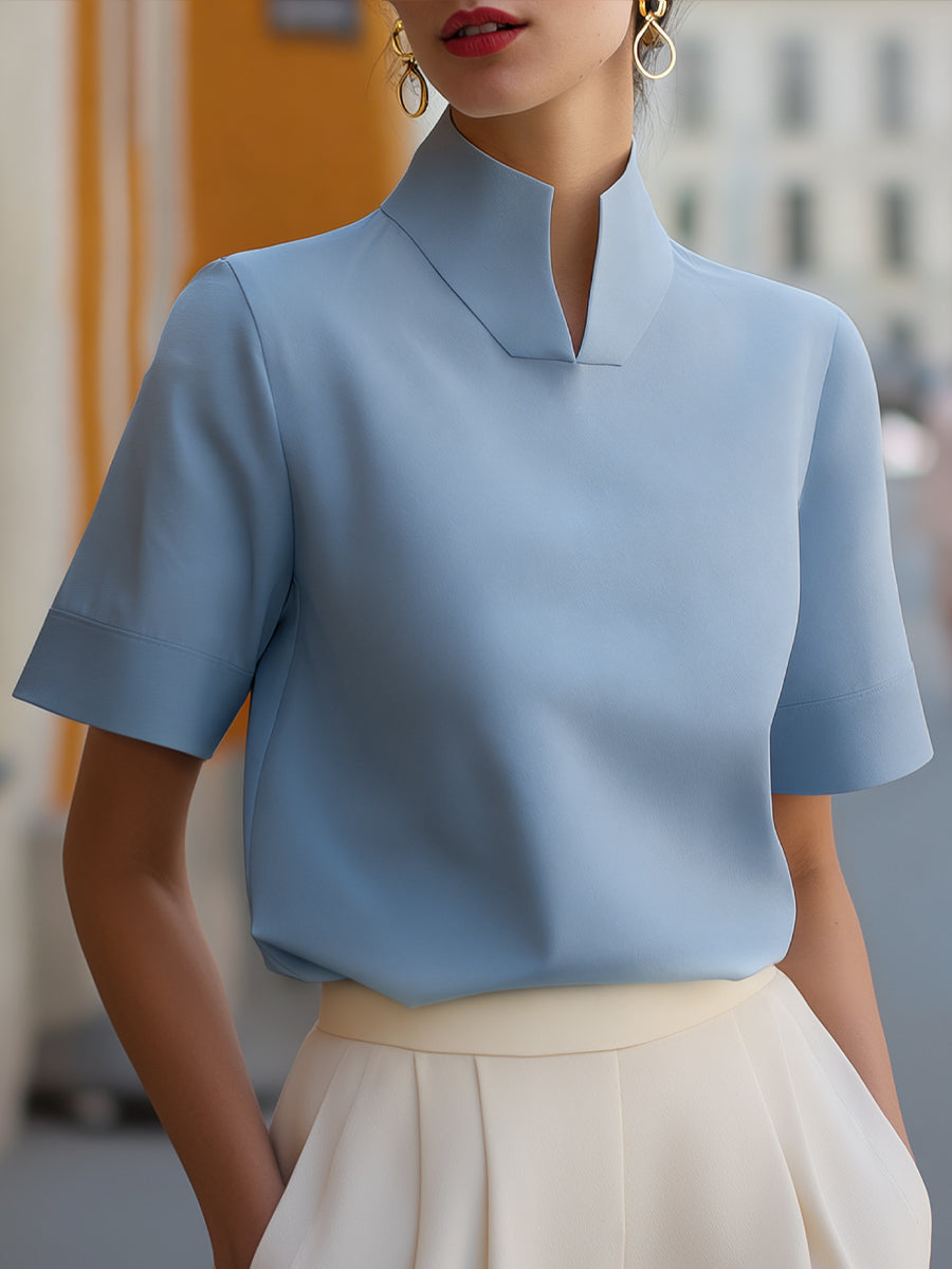 Women's elegant stand-collar short sleeve blouse, a versatile top for professional office wear or casual outings.