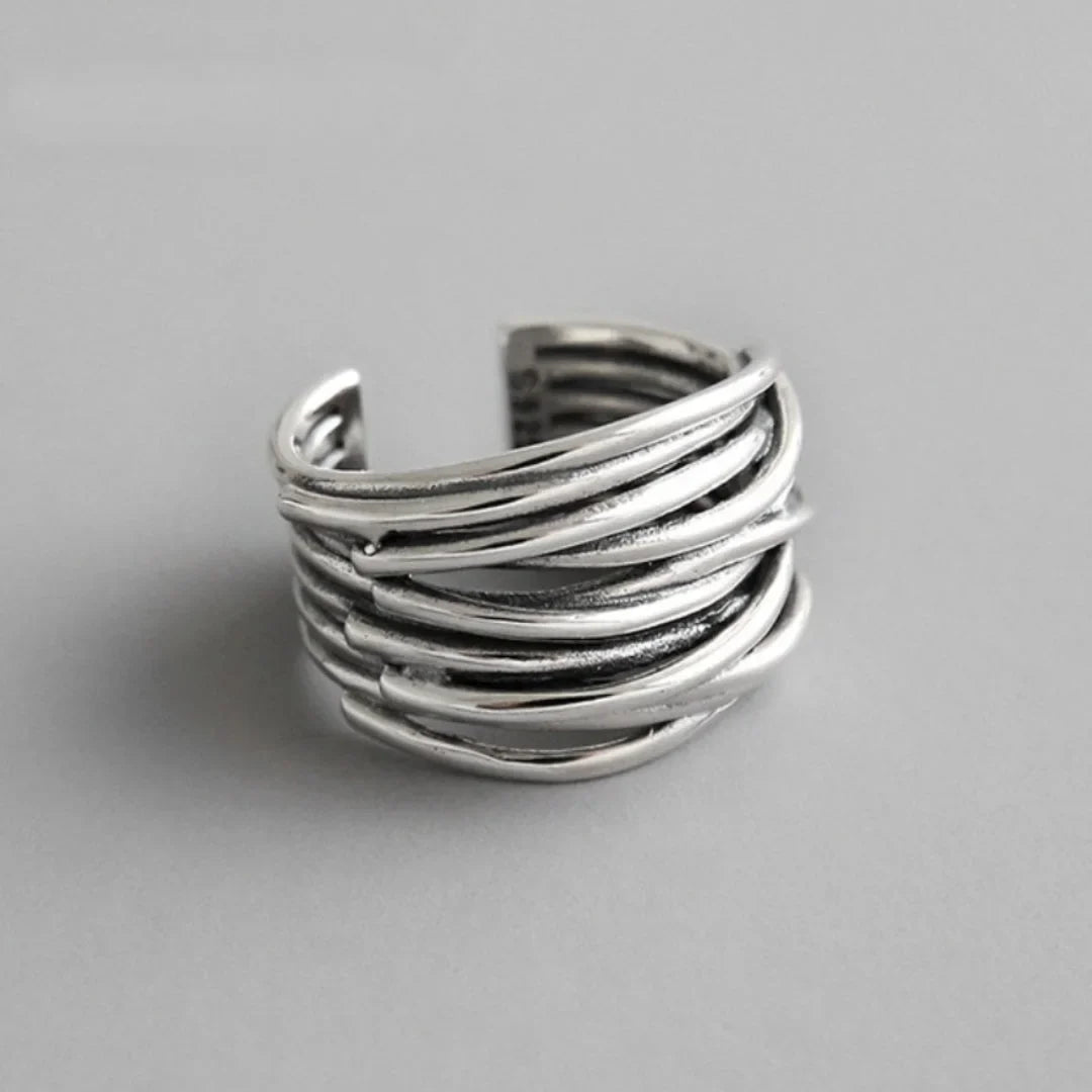 Elegant women's sterling silver adjustable layered open-cuff ring. A fashionable and versatile silver jewelry piece.