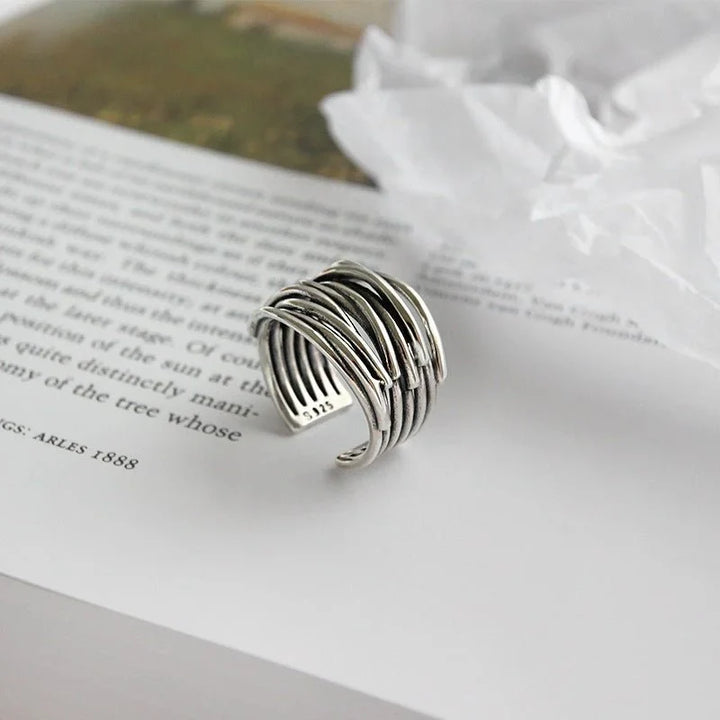 Fashionable women's sterling silver layered open-cuff adjustable ring. Versatile silver jewelry for any occasion.