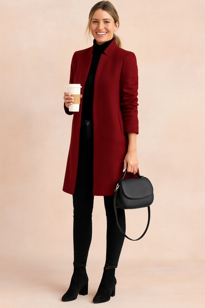 Back view of an elegant women's straight cut coat, showcasing its classic silhouette.